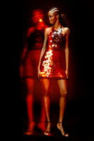 Onalaja Onalaja sequined emblem mini dress featuring a fitted silhouette and shimmering sequin details, perfect for evening wear.