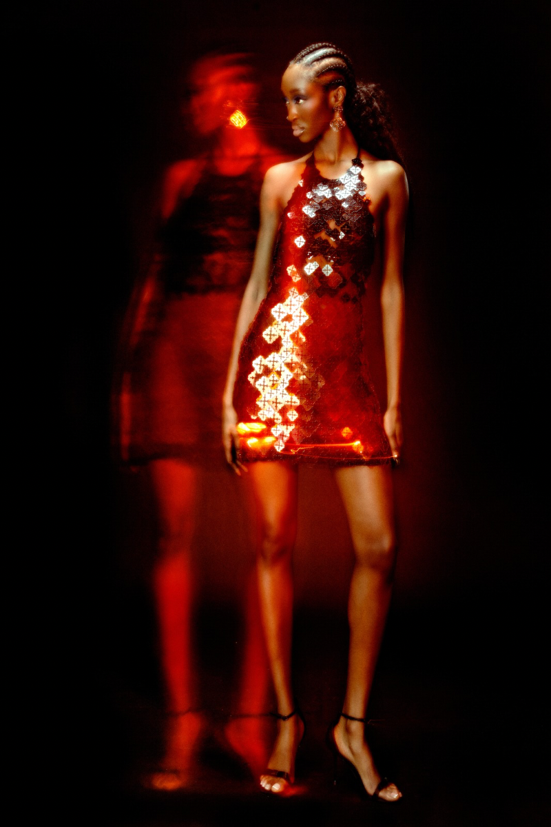 Onalaja Onalaja sequined emblem mini dress featuring a fitted silhouette and shimmering sequin details, perfect for evening wear.