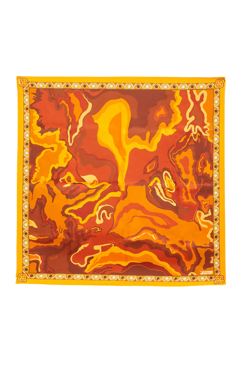Orange Onalaja RUWA scarf featuring a vibrant, patterned fabric with fringed edges, showcased laid flat.