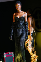 Onalaja LELA embellished black gloves with decorative details, shown on a hand in a close-up view.