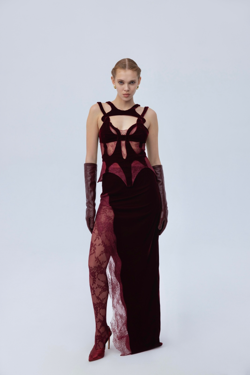 Soft velvet maxi skirt in mulberry color from Santa Brands, featuring a flowing design and elegant length.