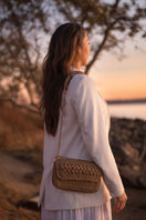 Mara Brazil Petala Lurex Shoulder Bag with metallic gold finish and elegant design, featuring a spacious interior and shoulder strap.