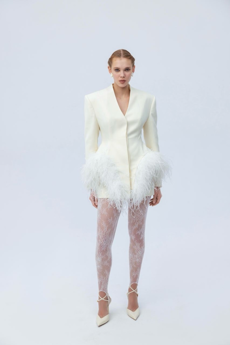 Ivory feather Basque jacket by Santa Brands, stylish outerwear with feather detailing and tailored fit for a sophisticated look.