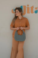 Mara Brazil LUA shoulder bag with sleek design and adjustable strap, featuring a stylish and functional accessory for everyday use.