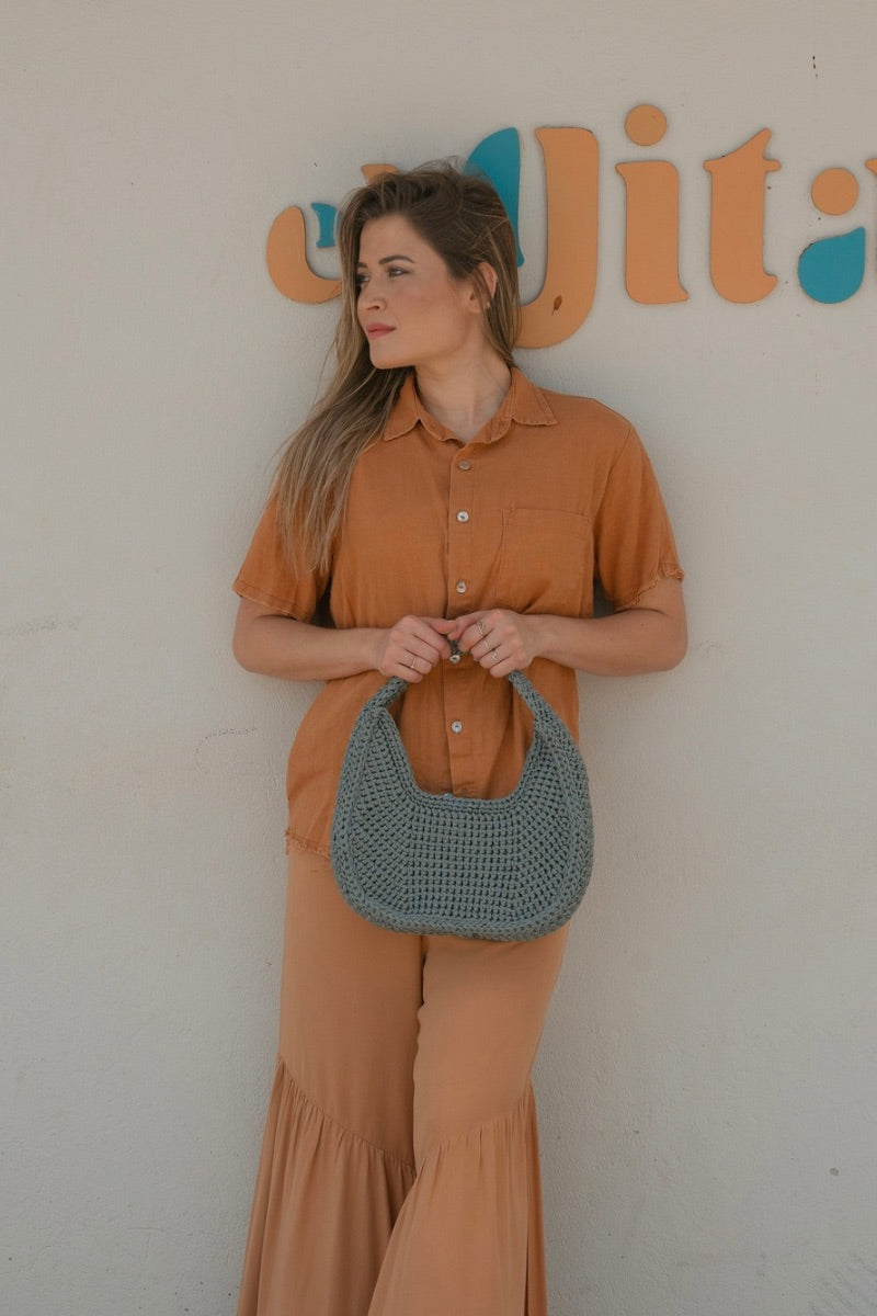 Mara Brazil LUA shoulder bag with sleek design and adjustable strap, featuring a stylish and functional accessory for everyday use.