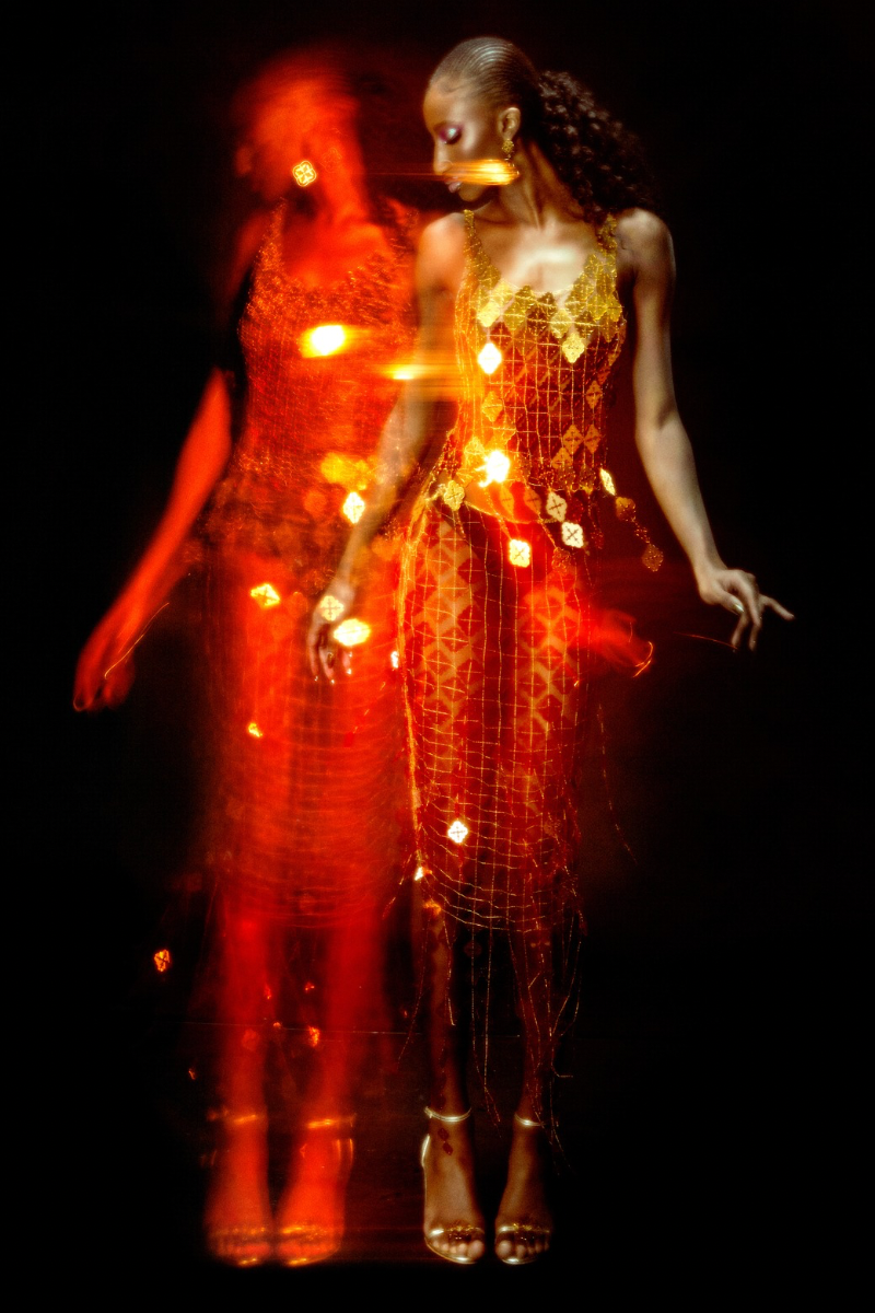 Onalaja sequined emblem midi skirt with shimmering details and a sleek, fitted silhouette for elegant style.