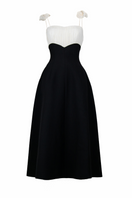 Maison Des Copains hyacinth A-line spaghetti strap midi dress displayed on a hanger with flowing fabric and elegant design.