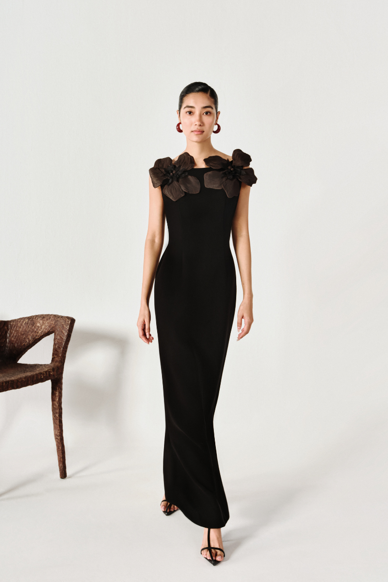 Elegant floral satin crepe gown by Levia featuring a flowing design and intricate floral pattern on smooth satin fabric.