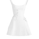 White corset A-line mini dress from Stolen Stores, featuring a fitted bodice and flared skirt, shown on a mannequin.
