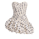 Stolen Stores balloon polka dot mini dress with puff sleeves and a fitted waist, featuring a playful polka dot pattern.
