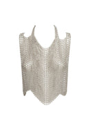 Silvia Gnecchi Sofia top in silver, stylish sleeveless blouse with a sleek, metallic finish, displayed on a hanger.