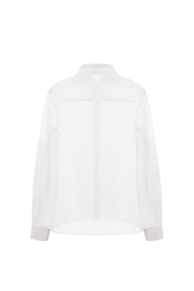 Light blue Levia Oversize Organza Shirt with long sleeves and a relaxed fit, featuring a sheer, flowy fabric.