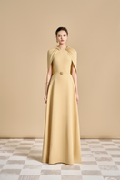 Maison Des Copains jasmine A-line cape-sleeved floor-length gown with elegant flowy fabric and sophisticated design.