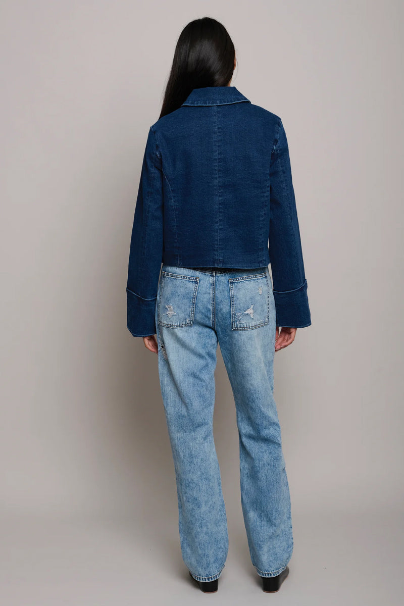 TT Studios Jane jacket, stylish women's jacket with a modern fit, shown in a neutral color on a hanger.