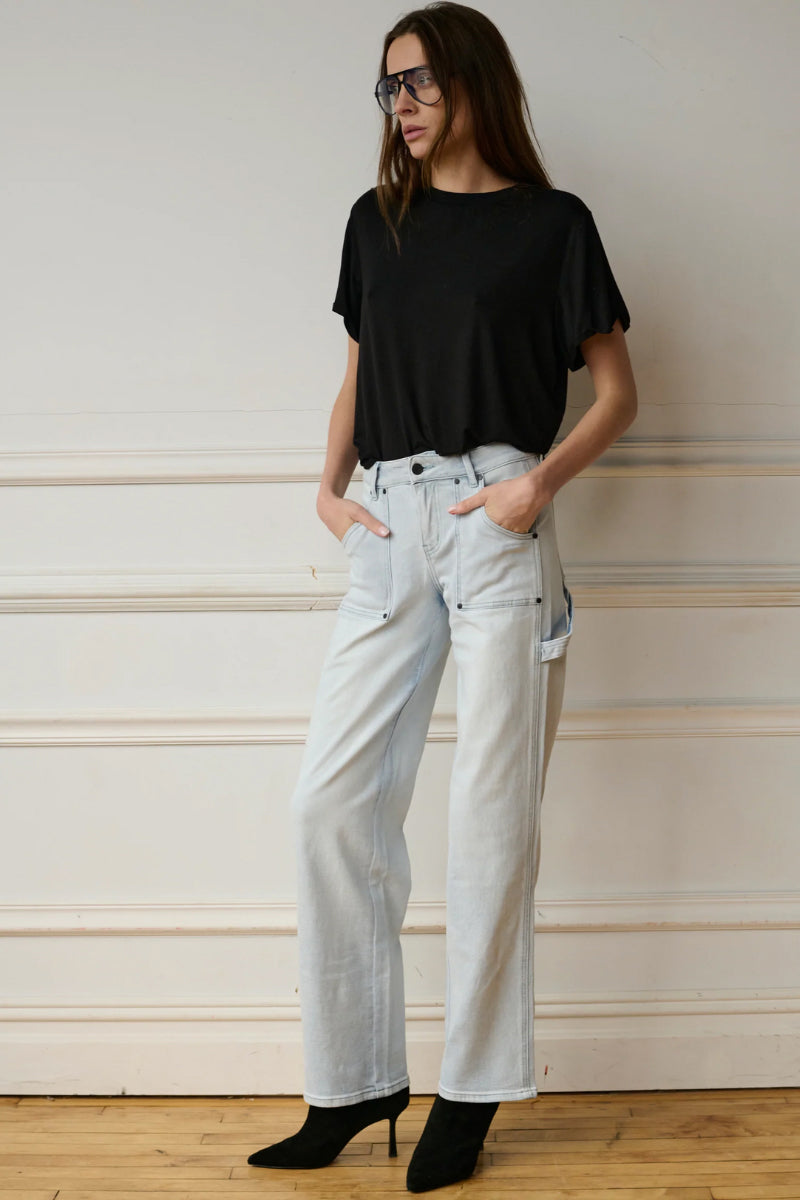 Blue Jade Jeans by TT Studios, showing the fitted denim jeans with classic five-pocket design and stylish stitching.
