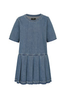 TT Studios Coco Dress mini dress featuring a stylish, fitted design with a sleeveless neckline and trendy pattern.