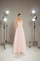 Pink crystal-embellished A-line maxi gown by Happy Clothing, flowing fabric and elegant design for formal occasions.