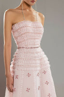 Pink crystal-embellished A-line maxi gown by Happy Clothing, flowing fabric with intricate crystal details and elegant design.