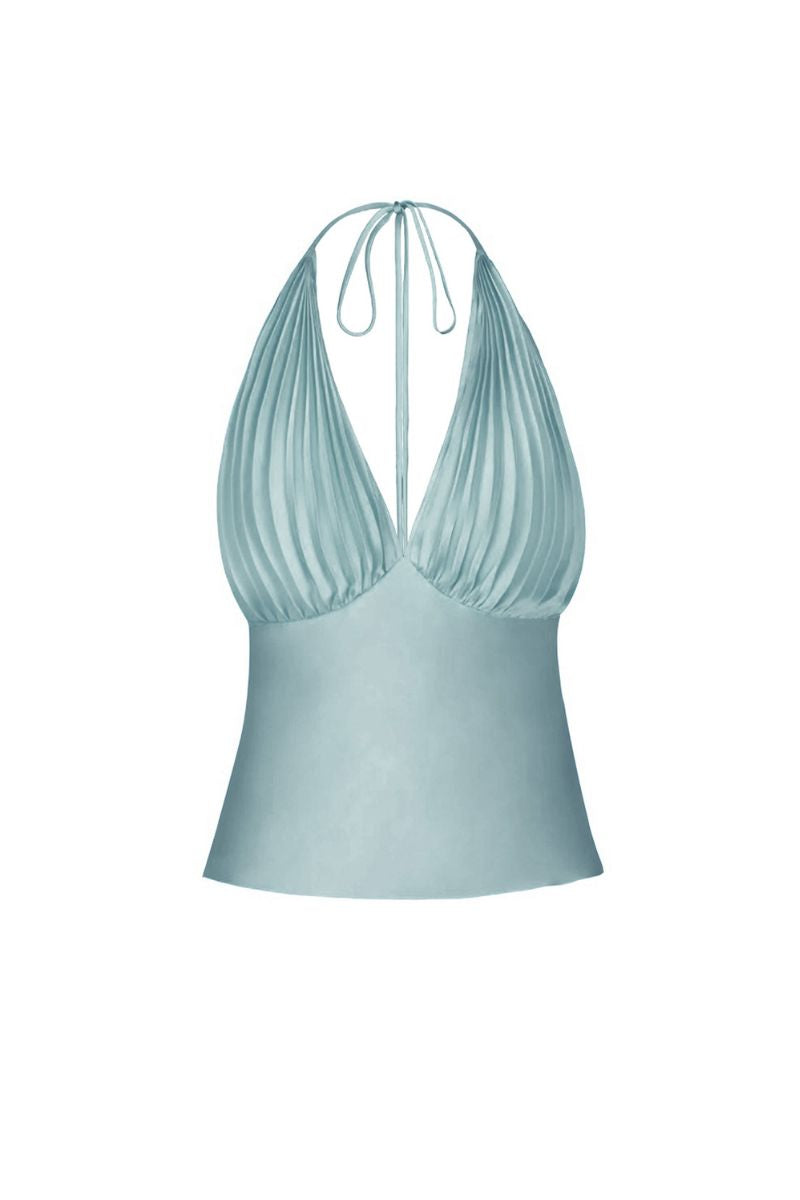Blue pleated top from Stolen Stores, styled as a casual women's fashion top with a modern pleated design.