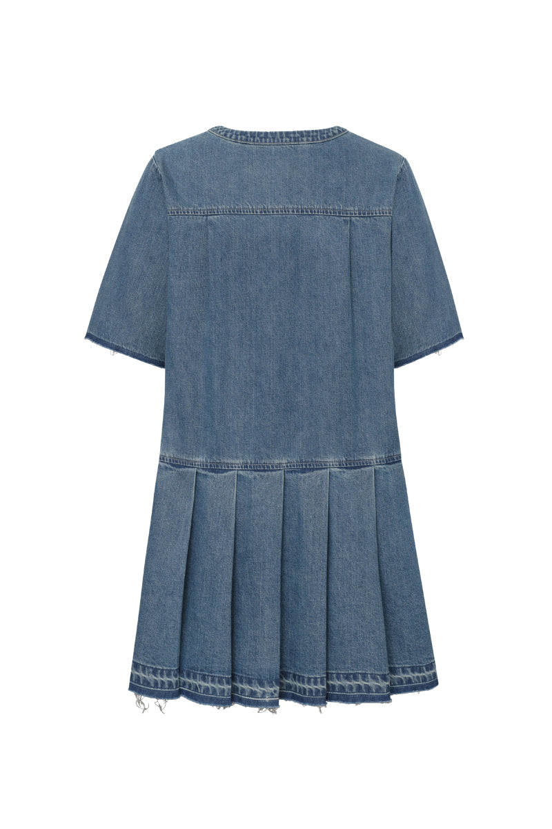 TT Studios COCO mini dress featuring a stylish, flowing design and vibrant pattern, perfect for casual and summer wear.