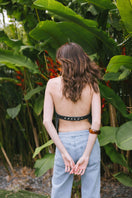 TT Studios Sofia top, stylish women’s sleeveless blouse with a flowy design, shown in a close-up image.