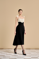 Maison Des Copains hyacinth A-line spaghetti strap midi dress with a fitted bodice and flowy skirt, perfect for elegant occasions.