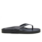 Black XENOS sandals by KIÓHNE with open toe design and adjustable straps, shown on a neutral background.