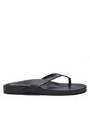 Black XENOS sandals by KIÓHNE with open toe design and adjustable straps, shown on a neutral background.