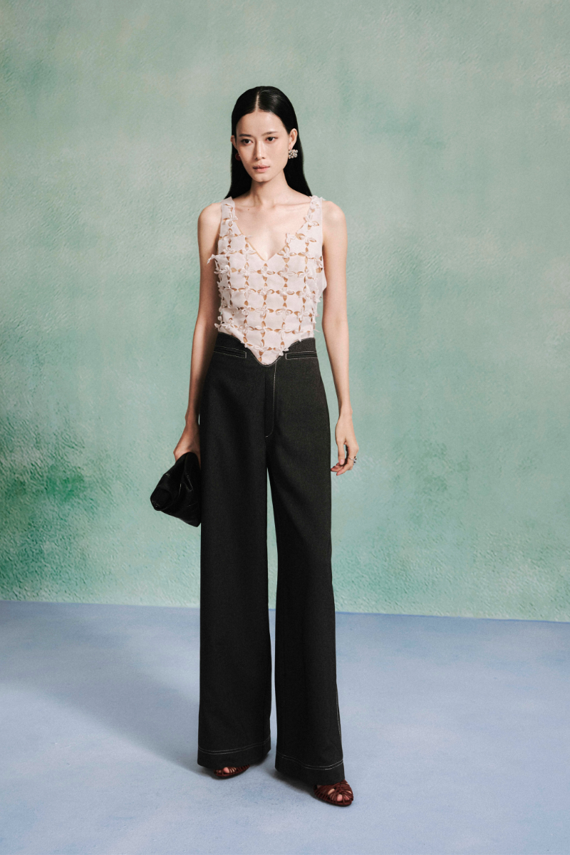 Laser cut mesh silk chiffon tank top by Levia featuring a delicate, semi-sheer mesh and silk chiffon design.