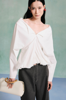 Light blue draped balloon blouse by Lecia featuring relaxed fit and flowing fabric, displayed on a hanger.