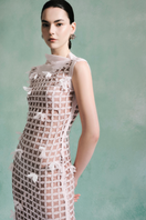 LECIA 3D column midi dress featuring a sleek silhouette and textured fabric, displayed on a hanger against a plain background.
