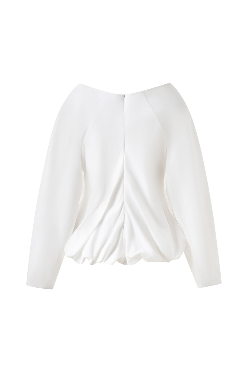 Light blue draped balloon blouse from LECIA, featuring flowing fabric and elegant design, shown on a hanger.
