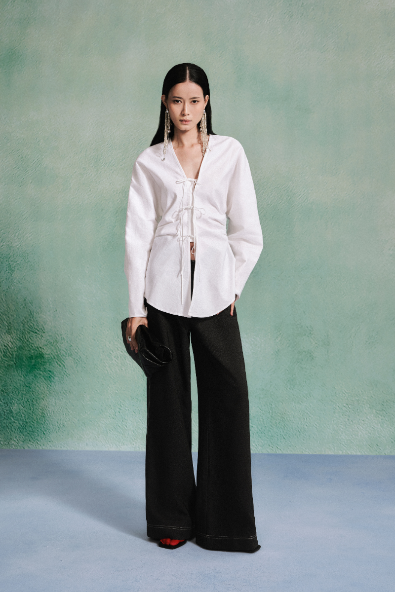 Lecia linen long sleeve shirt with a relaxed fit, featuring a classic collar and button-front design in a light, breathable fabric.