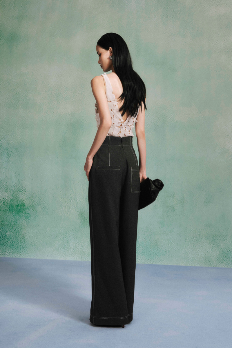 LECIA laser cut mesh silk chiffon tank top with intricate cutout design and flowing fabric.
