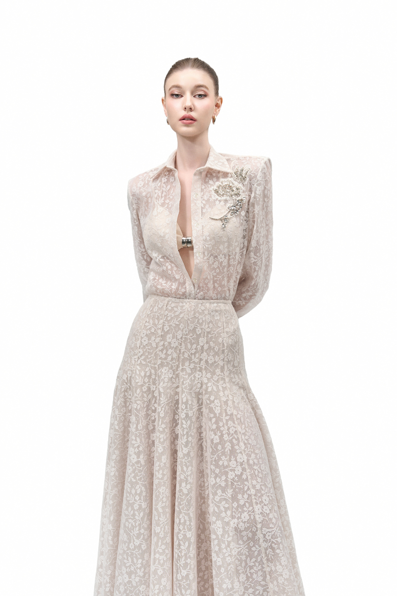 Maison Des Copains high waist lace maxi skirt with A-line silhouette and floor-length design, featuring intricate lace details.