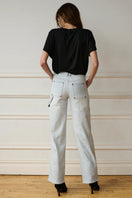 Blue Jade Jeans by TT Studios featuring classic denim fabric and a modern slim fit design.