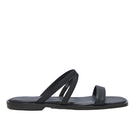 Black NOAH sandals by KIÓHNE featuring adjustable straps and a comfortable sole, shown on a neutral background.
