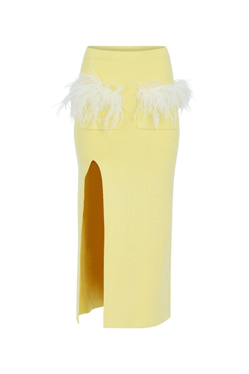 Yellow vanilla knit midi skirt with feather details from Andreeva, showcasing a textured knit fabric and feather accents.