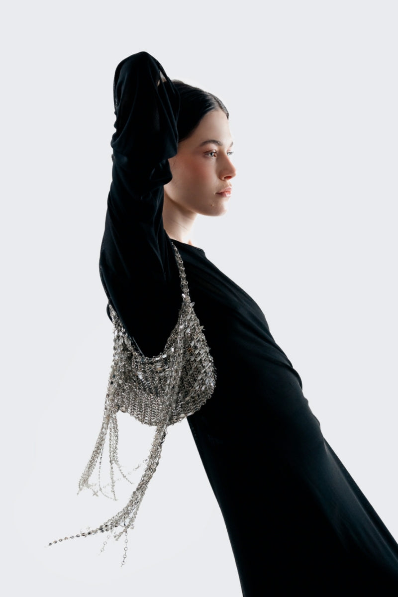 Millanne Tale Oslo clutch bag with sleek design and compact size, perfect for elegant evening or formal occasions.