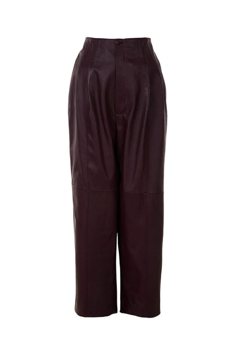 Japanese leather pants in wine red by MAZ Manuela Álvarez, showcasing their sleek fit and rich color.