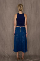 TT Studios JAN midi skirt, stylish and flowy, shown in a natural fabric with a sleek design perfect for casual or dressy occasions.