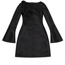 Black GIGI mini dress by Junie featuring a fitted silhouette and stylish design, shown on a model.