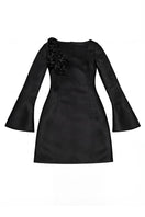 Black GIGI mini dress by Junie featuring a fitted silhouette and stylish design, shown on a model.