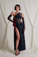 Elegant VITA gown by Somebodée, featuring flowing fabric and intricate detailing, perfect for formal occasions.
