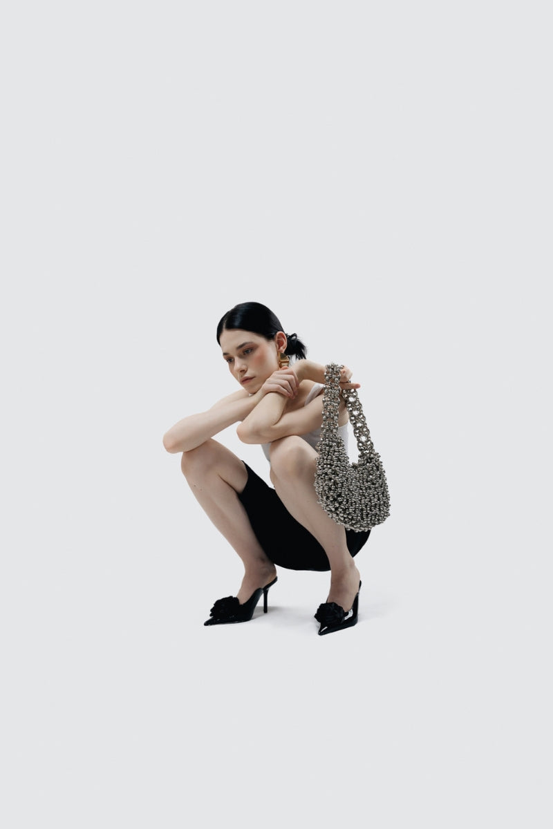 Millanne Tale HELEN shoulder bag with stylish design, featuring a spacious interior and adjustable strap for versatile carry options.