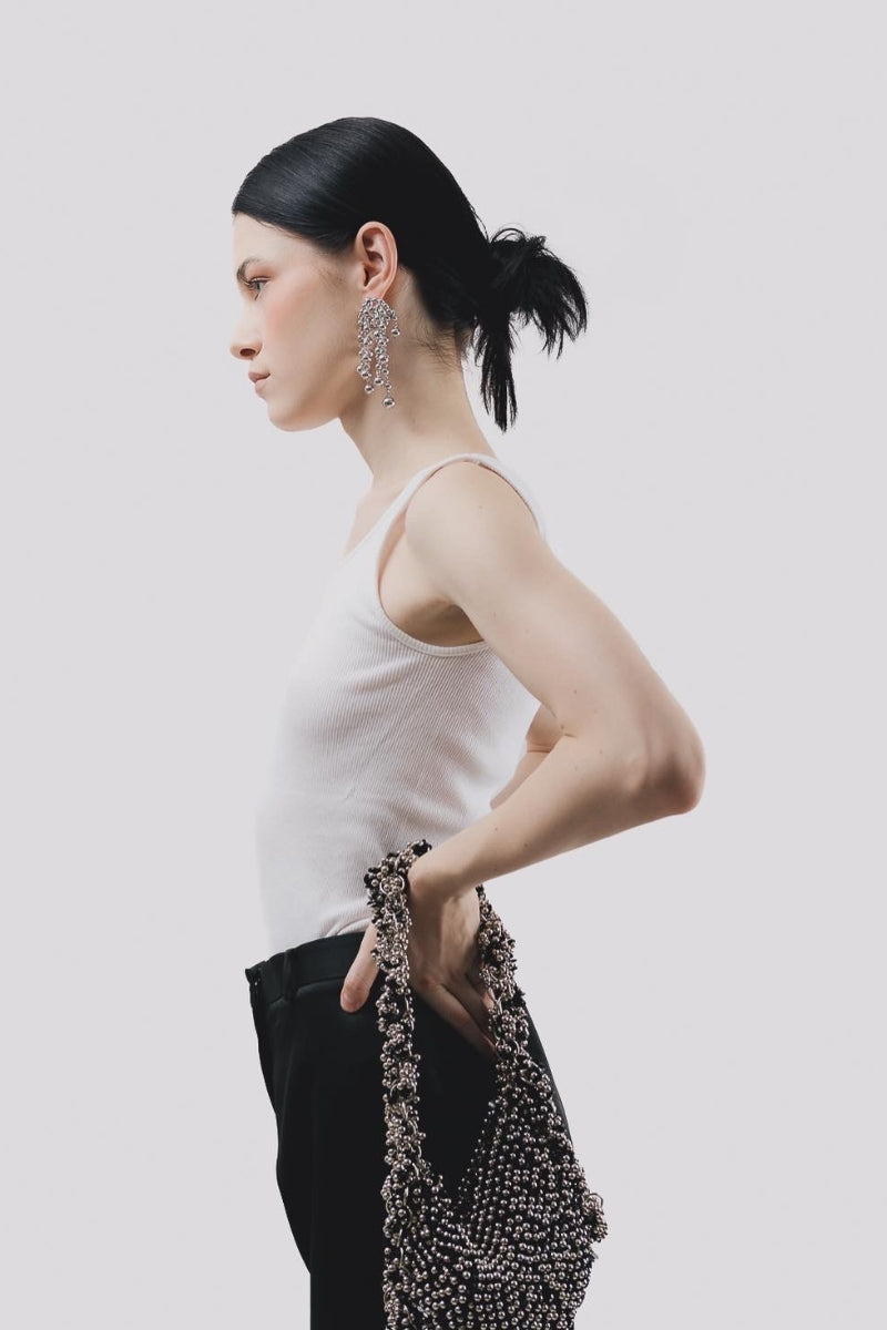 Millanne Tale ADHAR bag, a stylish top handle bag with a sleek design, perfect for everyday use and elegant styling.