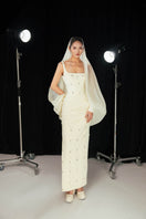Beige straight long gown from Happy Clothing with matching headscarf, featuring a modest, elegant design and flowing fabric.