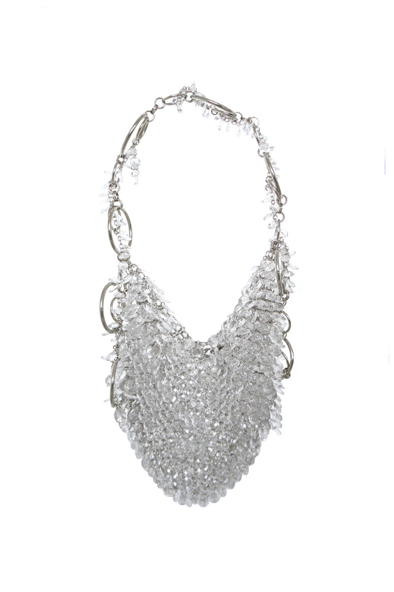 Millanne Tale glass shoulder bag with transparent design and stylish handle, perfect for modern fashion accessories.