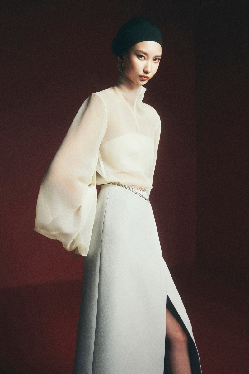 Maison Des Copains Arnold wrap front slit midi skirt in flowy fabric with a stylish slit at the front, perfect for elegant everyday wear.