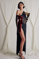 Elegant VITA GOWN by Somebodée featuring flowing fabric and detailed design, perfect for formal occasions and evening wear.